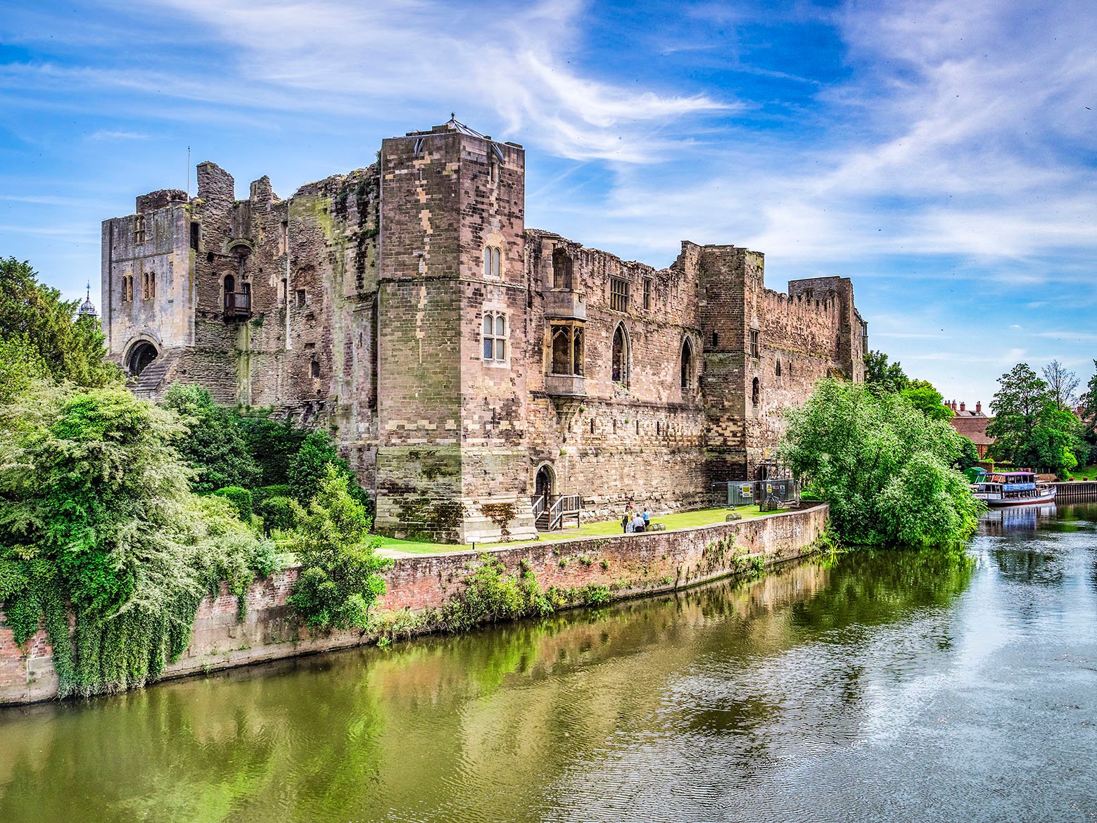 4 July 2019: Newark-on-Trent, Nottinghamshire, UK - Newark Castle and the River Trent in summer.